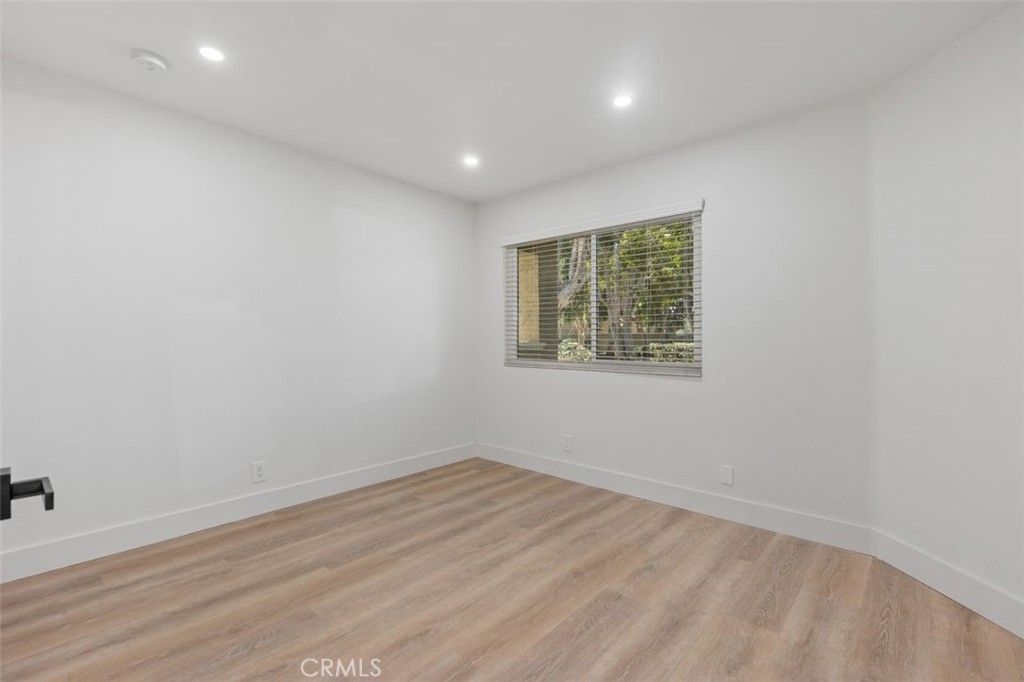 Downstairs den/office or possible bedroom - 142 Stanford Court 71, Irvine CA 92612 - photo 14