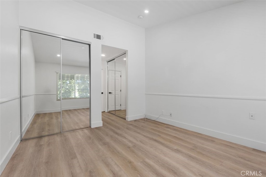 Second Primary Bedroom - 142 Stanford Court 71, Irvine CA 92612 - photo 23