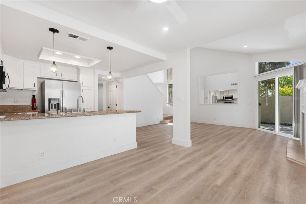 Kitchen and great room - 142 Stanford Court 71, Irvine CA 92612 - photo 9
