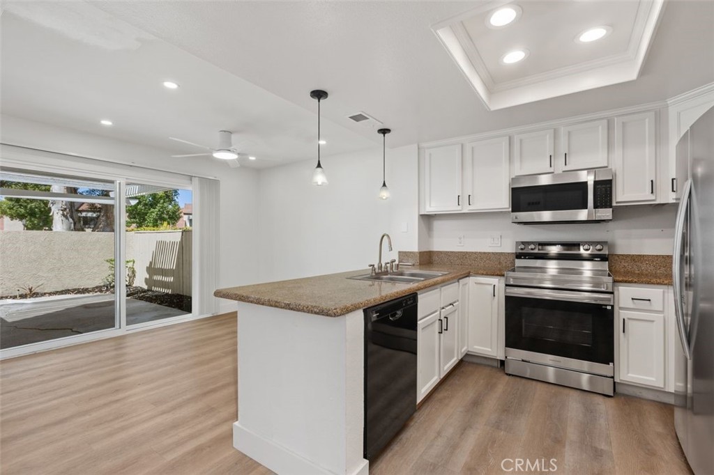 Kitchen and Dining - 142 Stanford Court 71, Irvine CA 92612 - photo 11