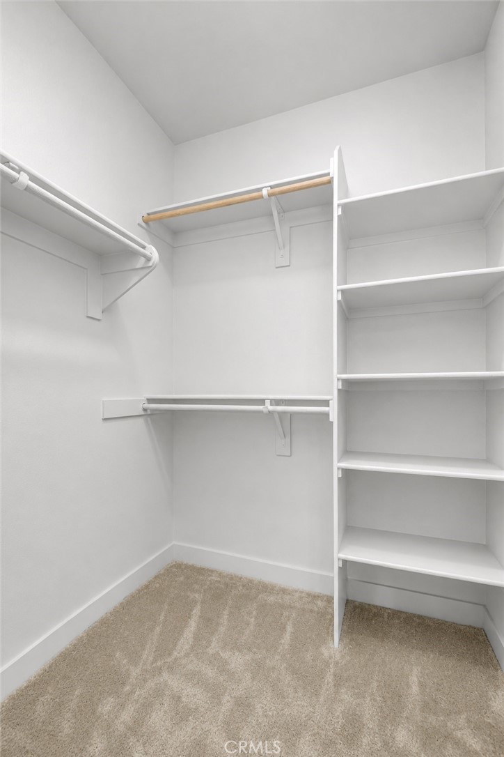 Walk-in closet - 143 Baluster, Irvine CA 92618 - photo 18