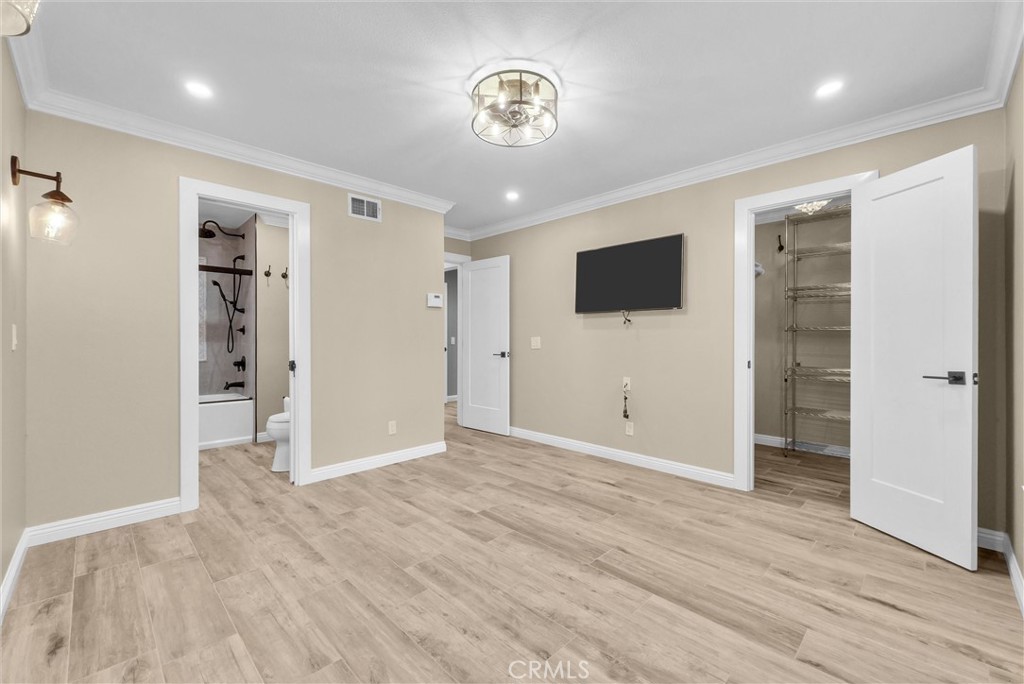 Master bedroom with walk-in closet - 146 Orchard, Irvine CA 92618 - photo 17