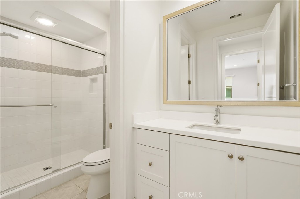 1st floor bathroom with a shower - 148 Villa Rdg, Irvine CA 92602 - photo 15