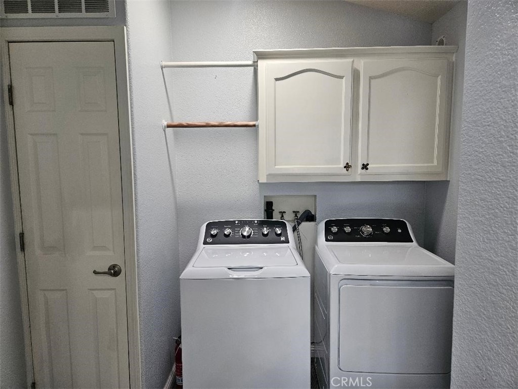 Laundry area - 14851 Jeffrey Rd, SPC 142, Irvine CA 92618 - photo 18