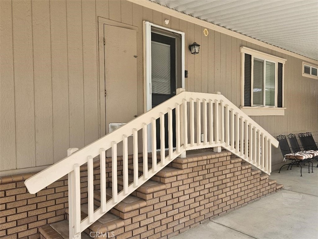 Entry from carport - 14851 Jeffrey Rd, SPC 142, Irvine CA 92618 - photo 21