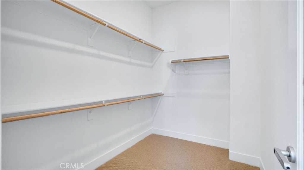 Primary Walk-In Closet #1 - 157 Sawbuck, Irvine CA 92618 - photo 22