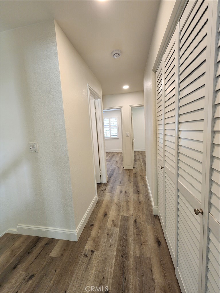 Hallways to 2nd and 3rd Bedroom - 168 Greenmoor 72, Irvine CA 92614 - photo 22