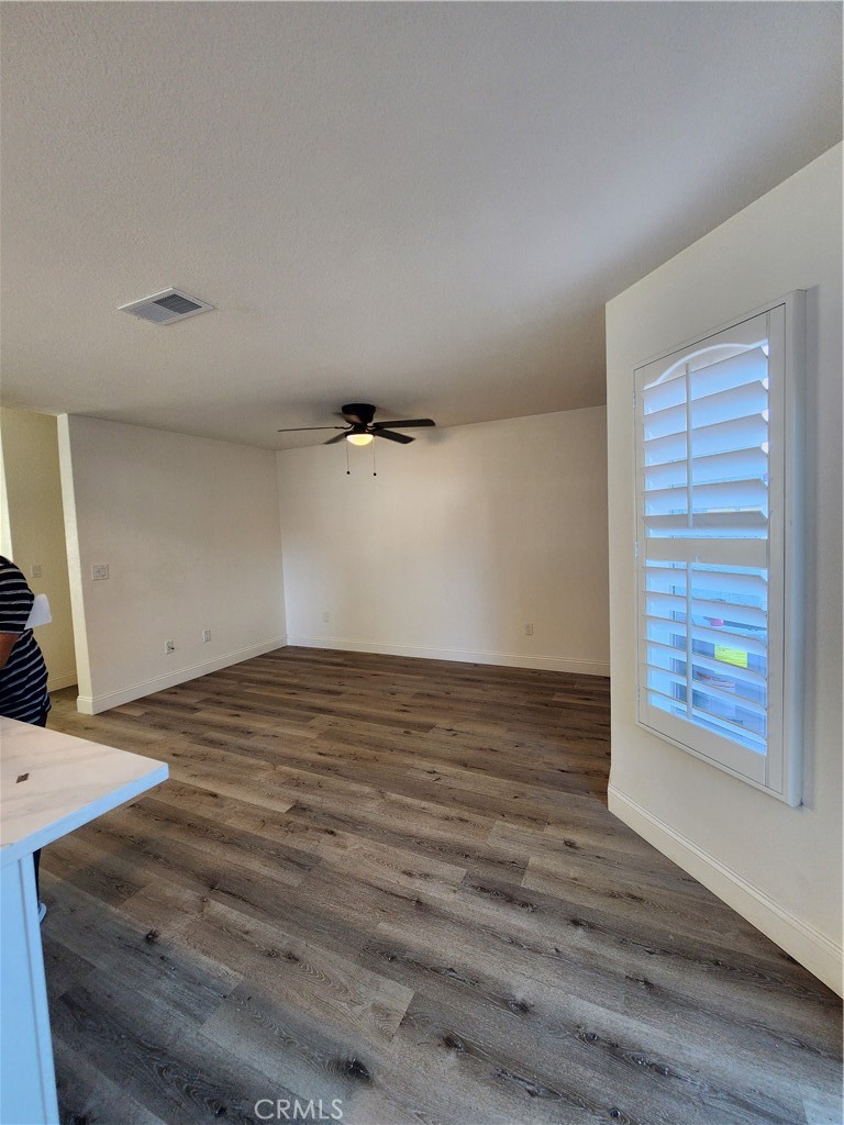 Spacious family room adjacent to kitchen. - 168 Greenmoor 72, Irvine CA 92614 - photo 29