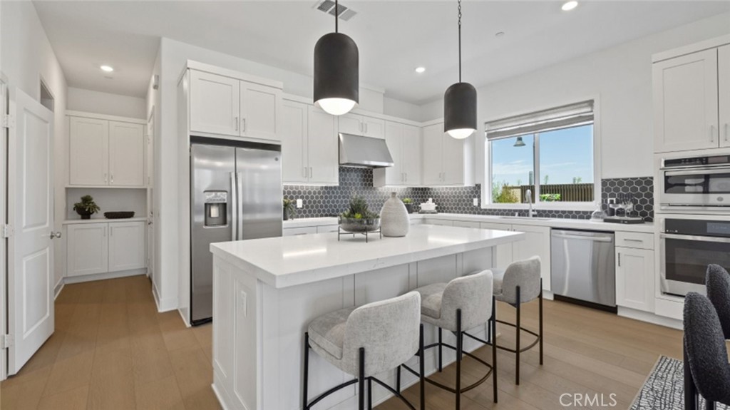 Photos shown are of model only- not actual homesite. - 169 Scoville, Irvine CA 92618 - photo 1