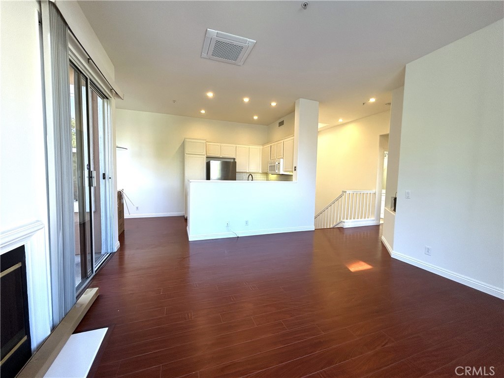 Living Room to Kitchen - 1701 Reggio Aisle, Irvine CA 92606 - photo 4