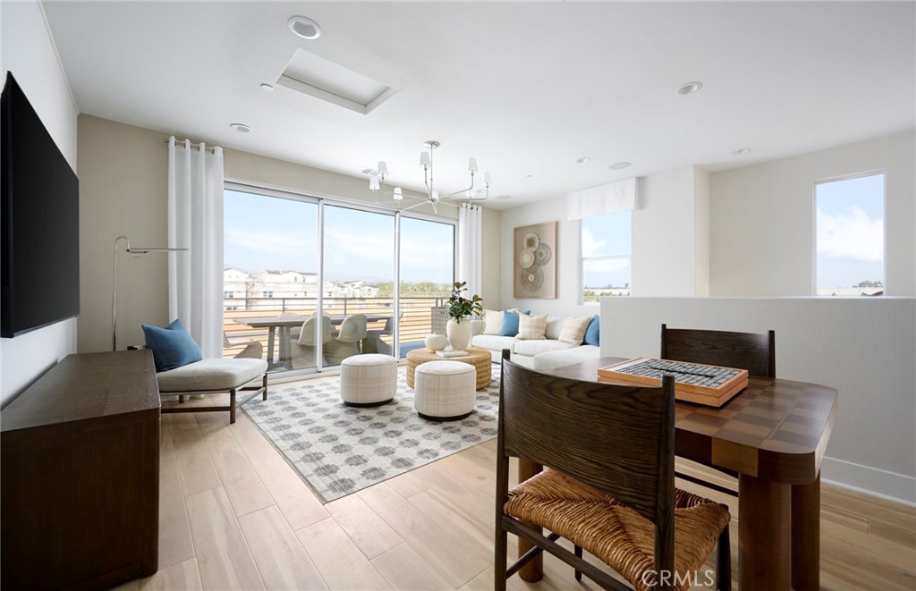 Photos uploaded are of the model representing the floor plan and are to demonstrate furniture layout. Furniture pictured - 171 Moody, Irvine CA 92618 - photo 14
