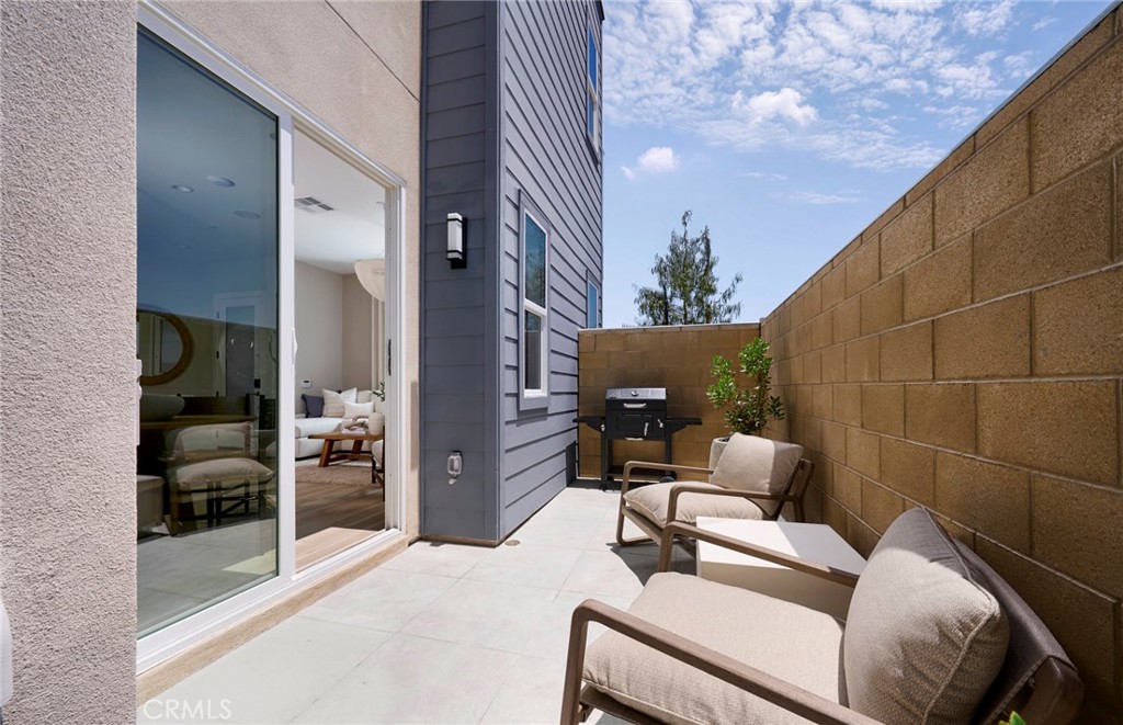 Photos uploaded are of the model representing the floor plan and are to demonstrate furniture layout. Furniture pictured - 171 Moody, Irvine CA 92618 - photo 15