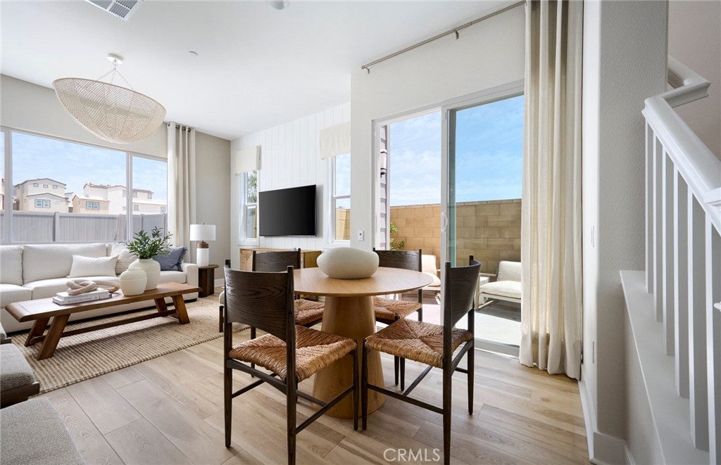 Photos uploaded are of the model representing the floor plan and are to demonstrate furniture layout. Furniture pictured - 171 Moody, Irvine CA 92618 - photo 16