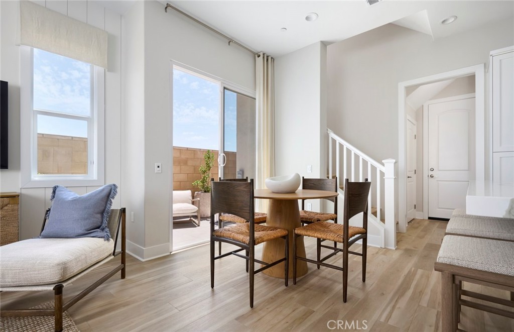 Photos uploaded are of the model representing the floor plan and are to demonstrate furniture layout. Furniture pictured - 171 Moody, Irvine CA 92618 - photo 17