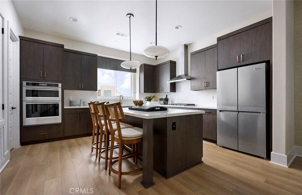 Photos uploaded are of the model representing the floor plan and are to demonstrate furniture layout. Furniture pictured - 175 Moody, Irvine CA 92618 - photo 3