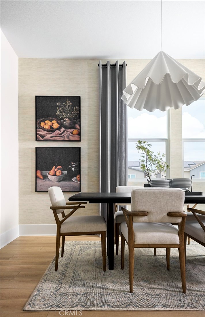 Photos uploaded are of the model representing the floor plan and are to demonstrate furniture layout. Furniture pictured - 175 Moody, Irvine CA 92618 - photo 4
