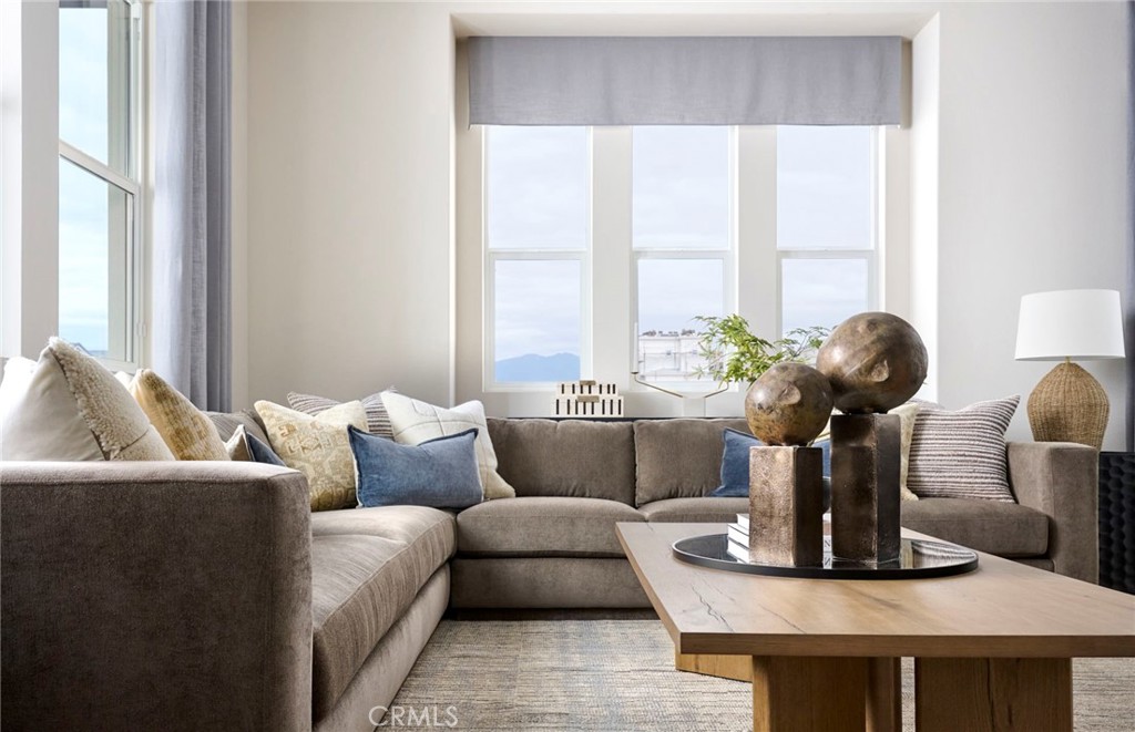 Photos uploaded are of the model representing the floor plan and are to demonstrate furniture layout. Furniture pictured - 175 Moody, Irvine CA 92618 - photo 5