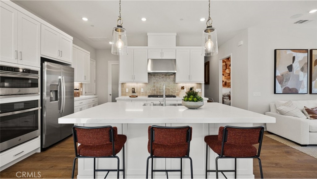 Photos shown are of model only- not actual homesite. - 177 Scoville, Irvine CA 92618 - photo 1