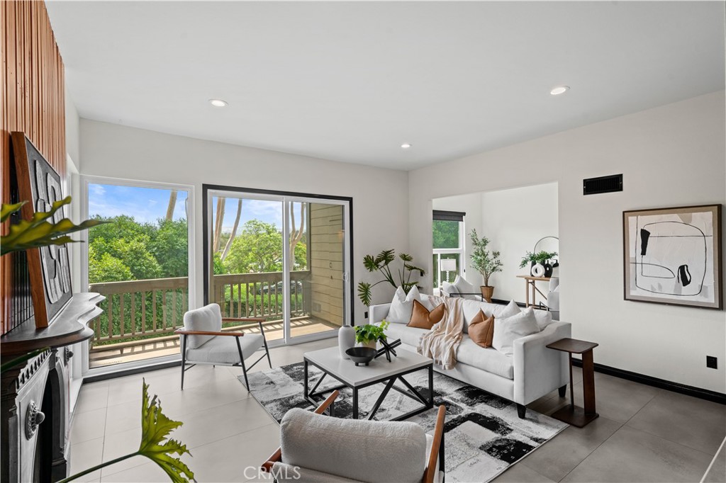 Living Room towards Den - 18 Rana 58, Irvine CA 92612 - photo 5