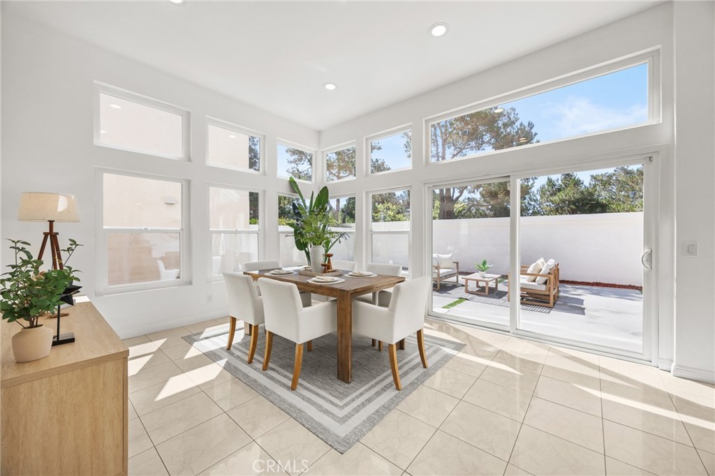 Dining room/Sunroom - 19 Tiara, Irvine CA 92614 - photo 10