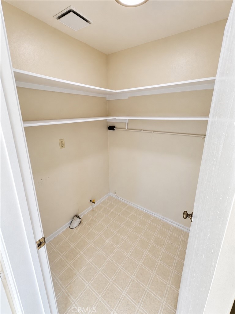 Laundry room and storage area - 2 Greenleaf, Irvine CA 92604 - photo 9