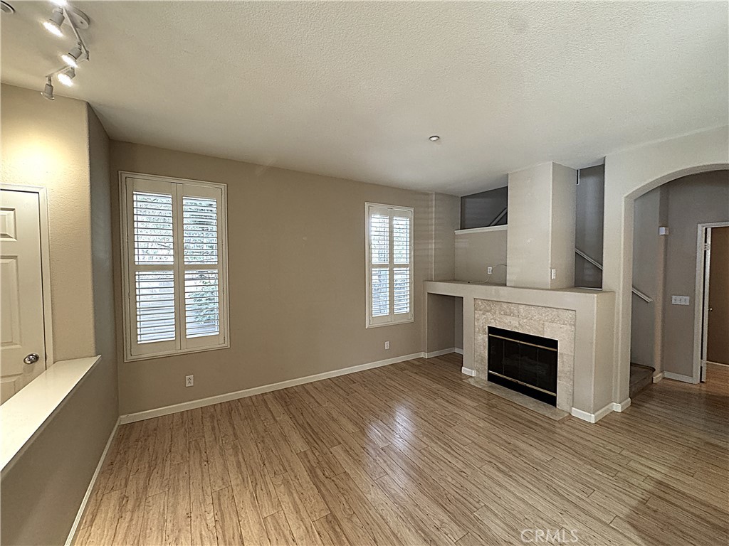 Living Room with Gas Fireplace - 204 Falcon, Irvine CA 92618 - photo 5