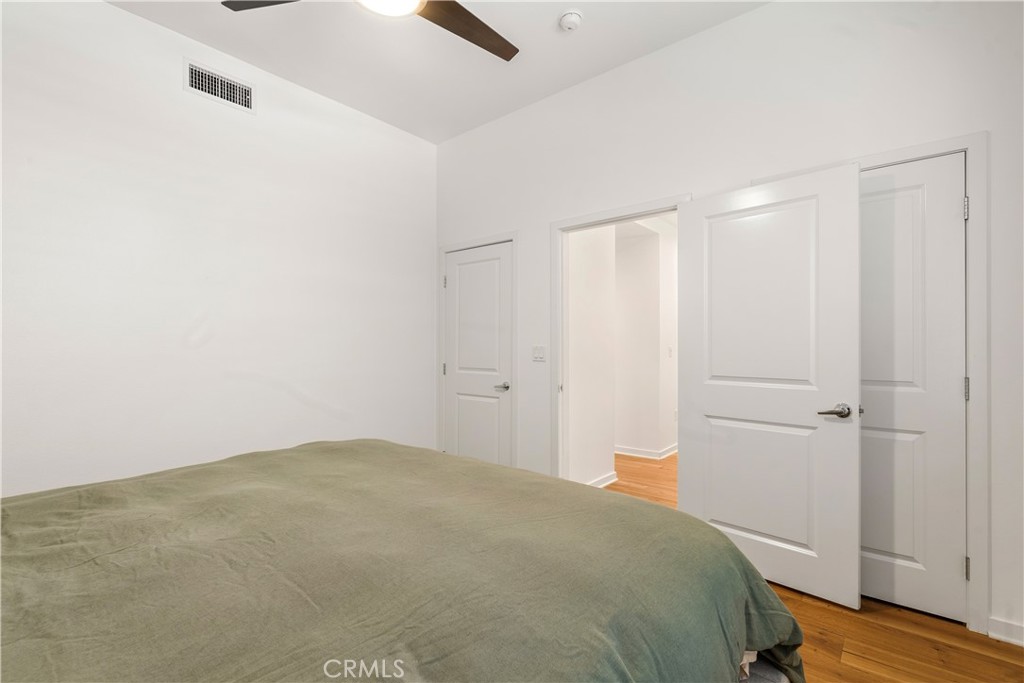 Versatile bedroom or office space offering privacy and flexibility to fit your lifestyle needs. - 21 Gramercy 102, Irvine CA 92612 - photo 12
