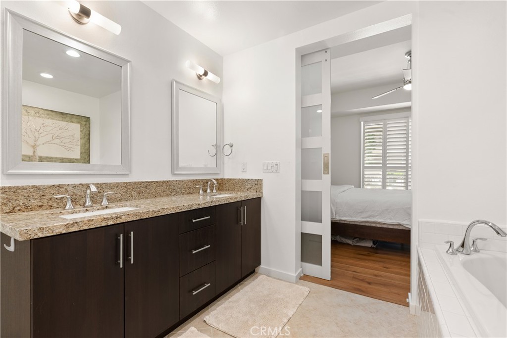Bright and modern bathroom designed with clean lines and upscale details. - 21 Gramercy 102, Irvine CA 92612 - photo 18