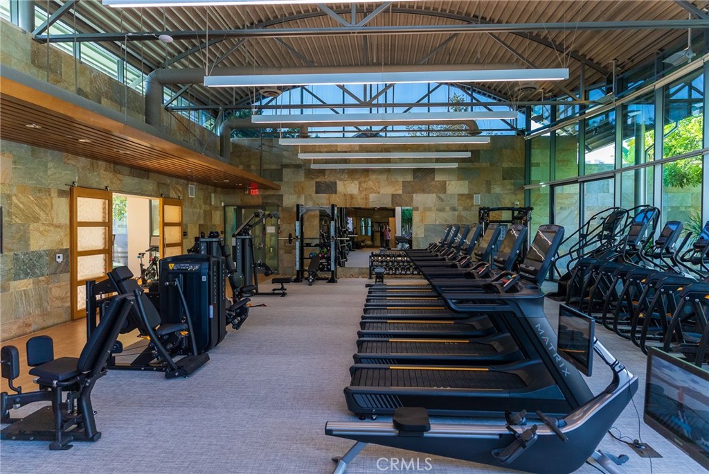 Modern resident gym with premium equipment for a complete at home fitness experience. - 21 Gramercy 102, Irvine CA 92612 - photo 27