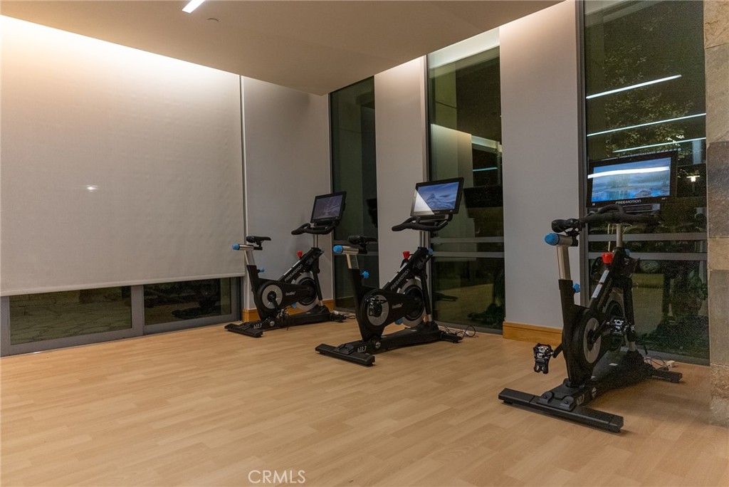 State of the art fitness center featuring premium equipment and modern design. - 21 Gramercy 102, Irvine CA 92612 - photo 29