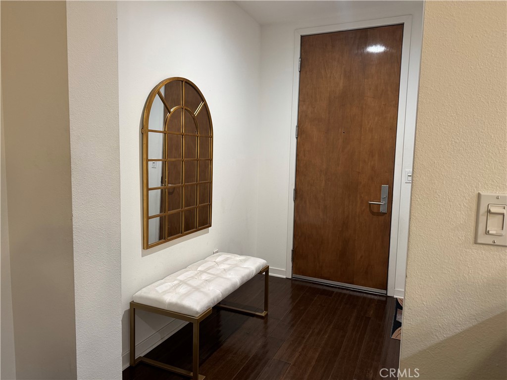front door entrance bench and mirror. - 21 Gramercy 218, Irvine CA 92612 - photo 12