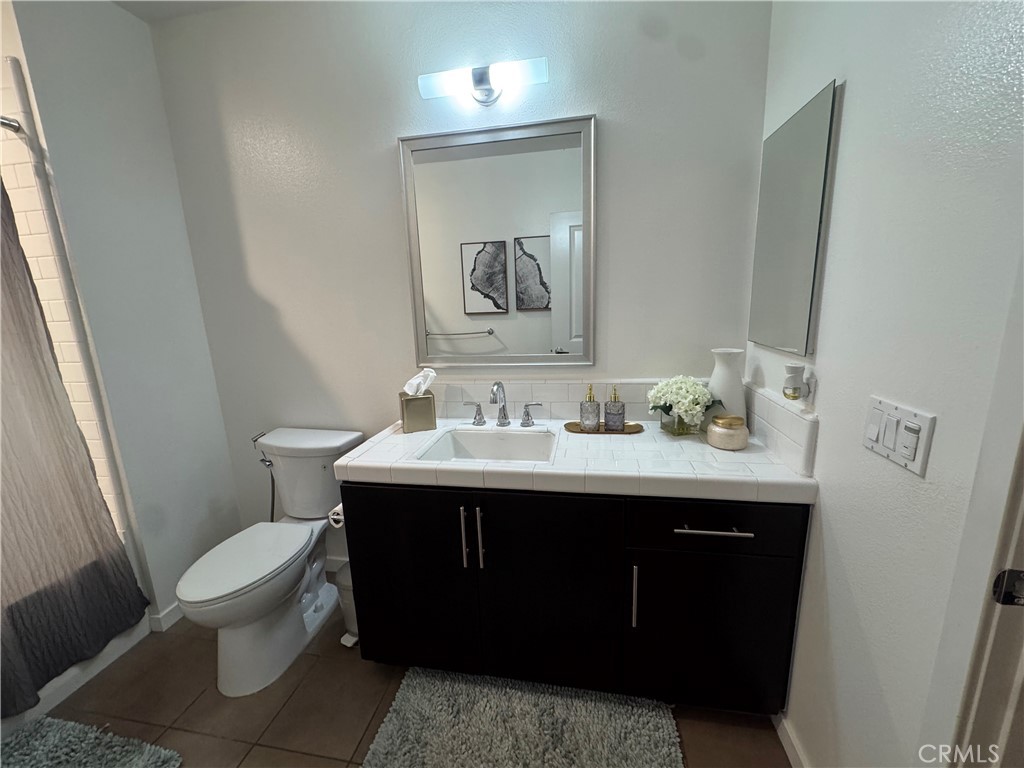 Upgraded faucets and vanities. - 21 Gramercy 218, Irvine CA 92612 - photo 31