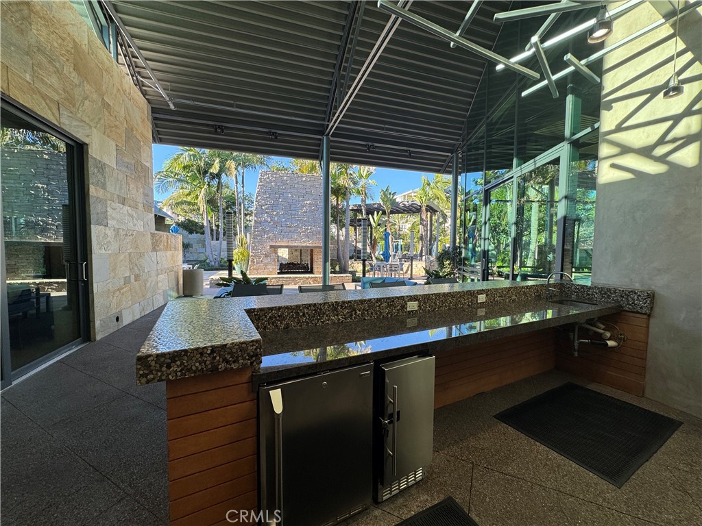 Large bar for your guests at the club house. - 21 Gramercy 218, Irvine CA 92612 - photo 35