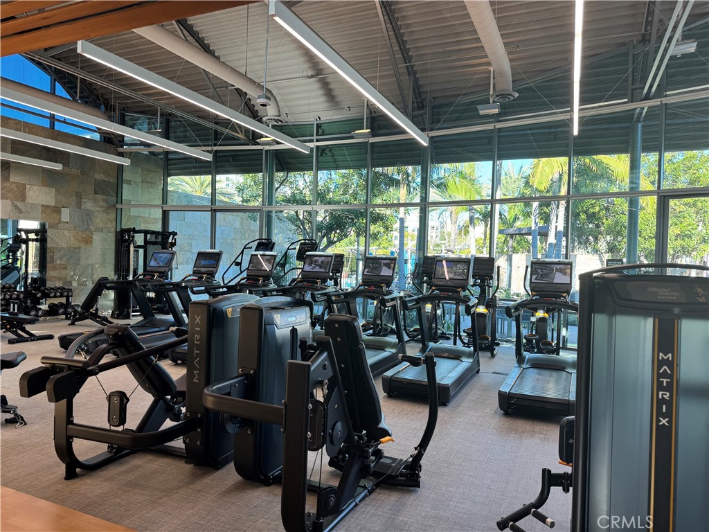 full size gym has many updated exercise machines. - 21 Gramercy 218, Irvine CA 92612 - photo 41