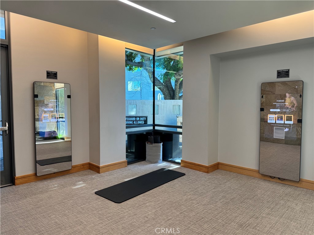 Gym is equipped with the mirror personal trainers. - 21 Gramercy 218, Irvine CA 92612 - photo 45