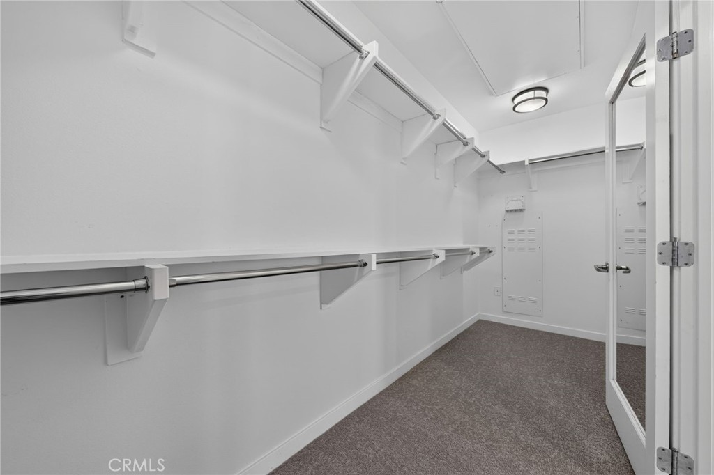 primary walk in closet - 21 Gramercy 309, Irvine CA 92612 - photo 19