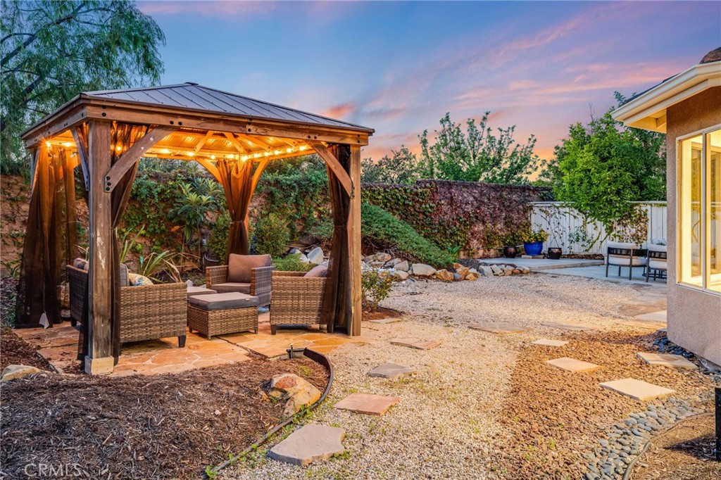 With no residence directly behind the property, the backyard enjoys a sense of privacy that's increasingly difficult to - 21 Rhode Island, Irvine CA 92606 - photo 35