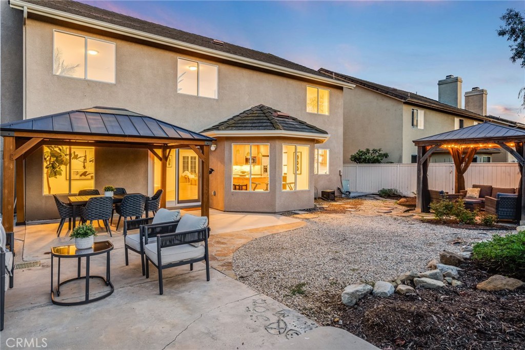 With no residence directly behind the property, the backyard enjoys a sense of privacy that's increasingly difficult to - 21 Rhode Island, Irvine CA 92606 - photo 36