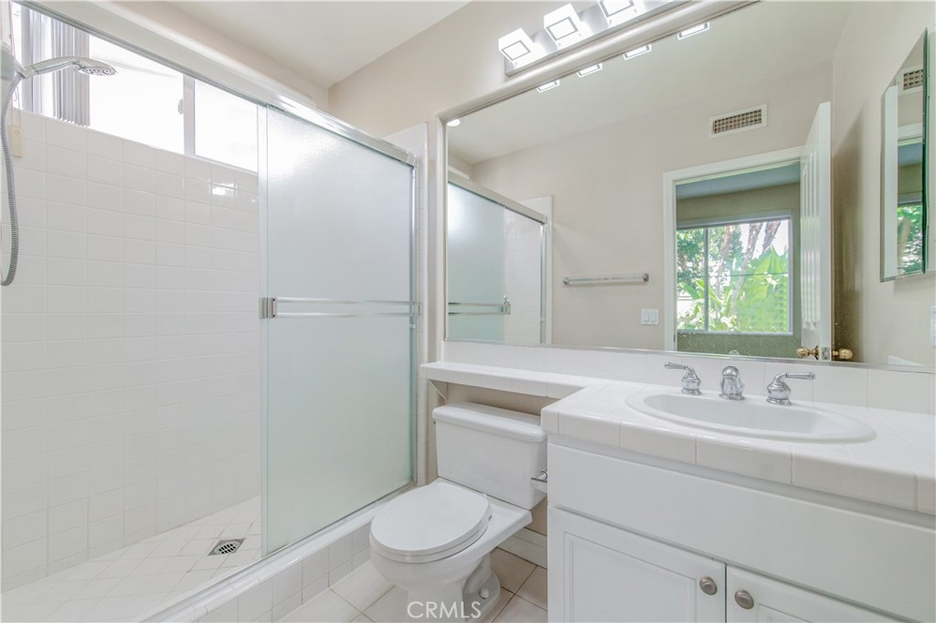 downstairs junior suite attached bathroom - 21 Sovente, Irvine CA 92606 - photo 32