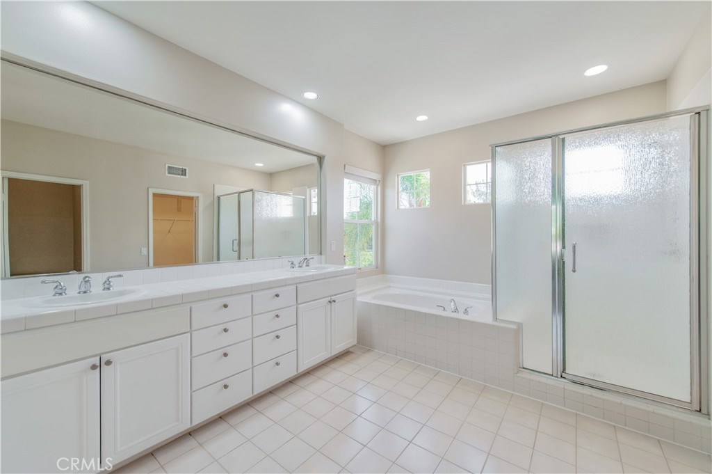 master bathroom, the other side with a second walk in closet - 21 Sovente, Irvine CA 92606 - photo 42