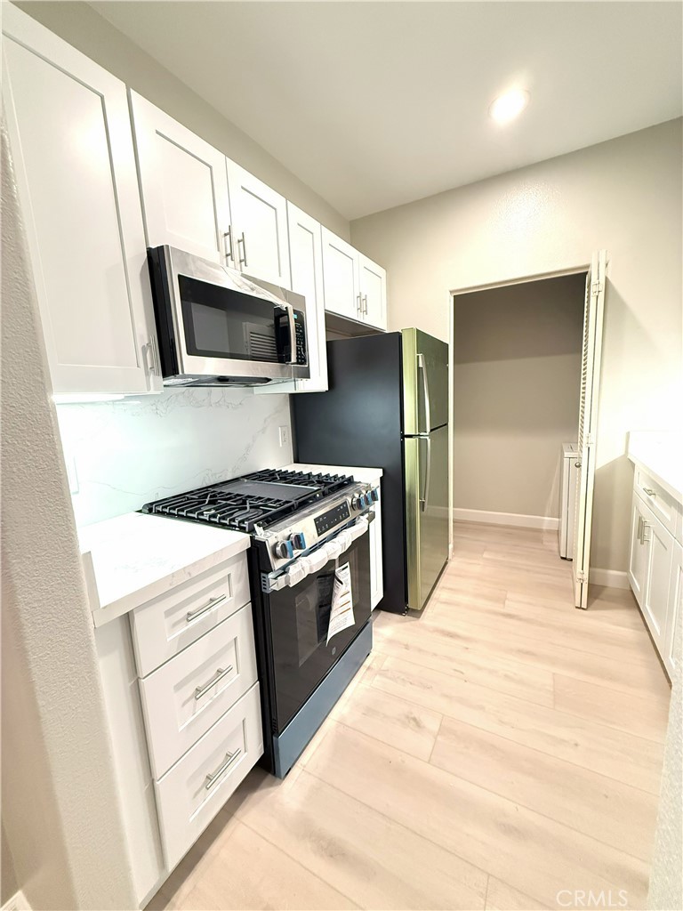 2115 Watermarke Place, Irvine CA 92612 - photo 2