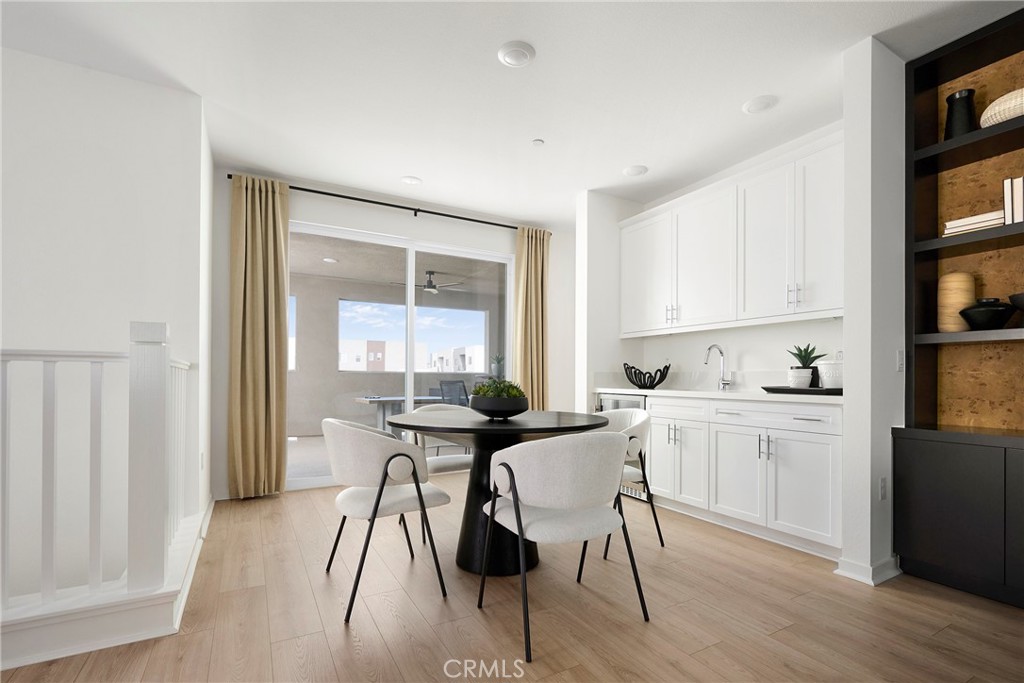 Model Photos: Photos shown are of the model home for this floor plan. Actual finishes, features, and landscaping may var - 217 Blue Wing, Irvine CA 92618 - photo 3