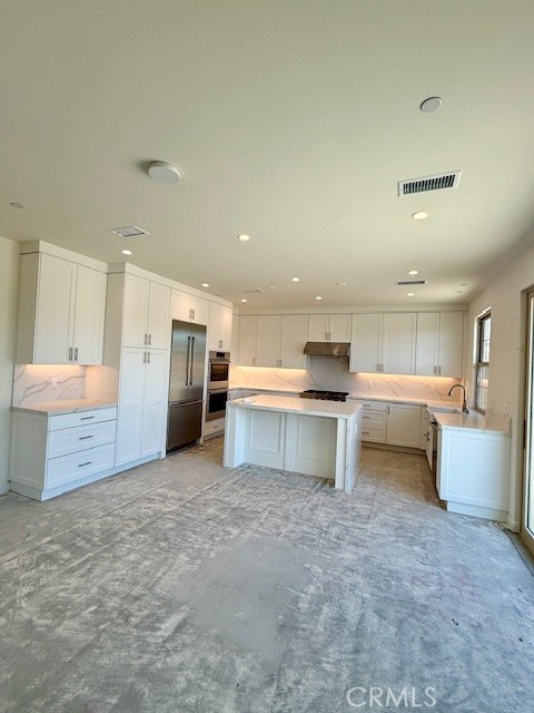 Large kitchen w/island & Bosch built in frig - 226 Canterbury, Irvine CA 92618 - photo 2