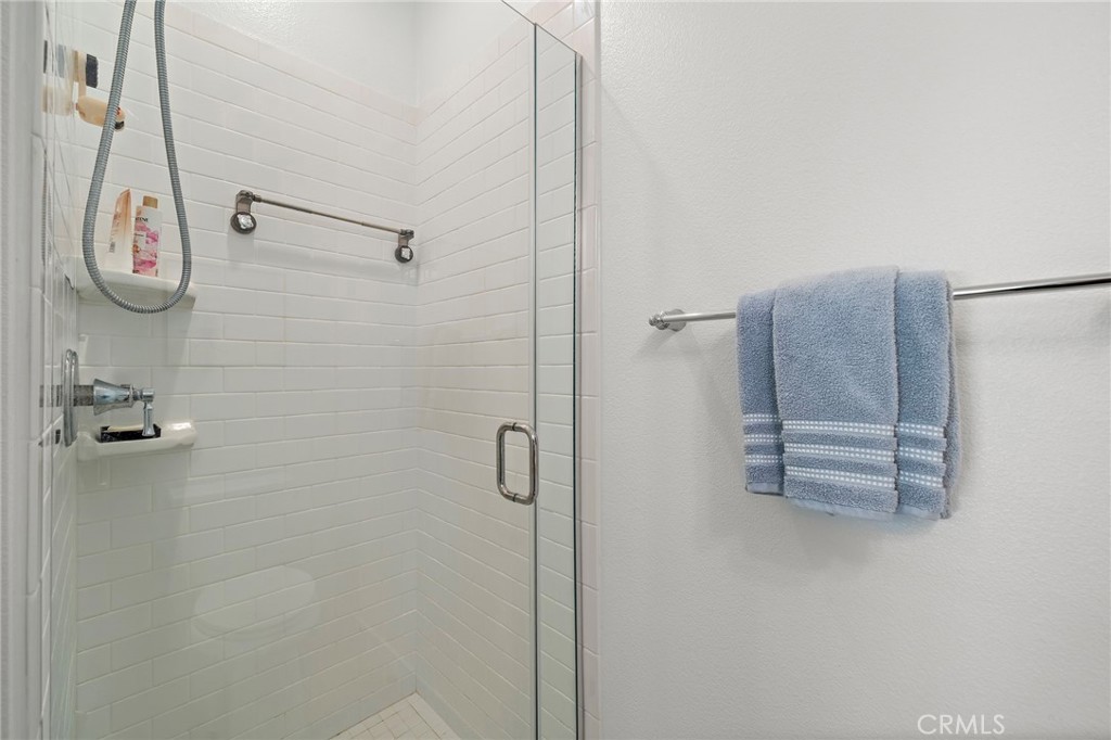 Shower with glass enclosure in first floor bedroom - 230 Abacus, Irvine CA 92618 - photo 23