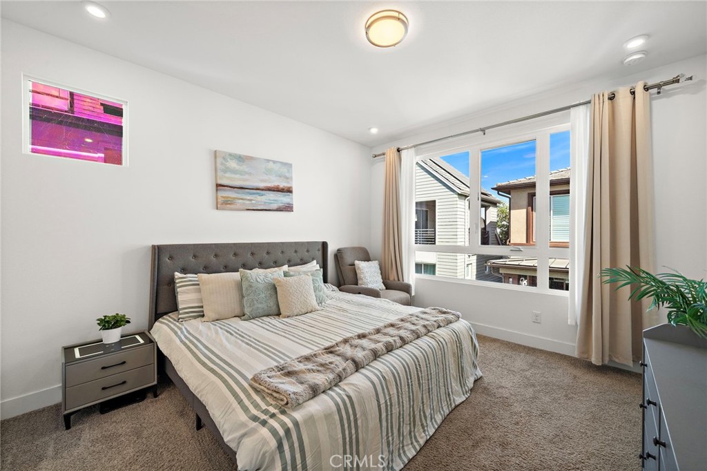 Contemporary primary suite with walk-in closet - 230 Abacus, Irvine CA 92618 - photo 25