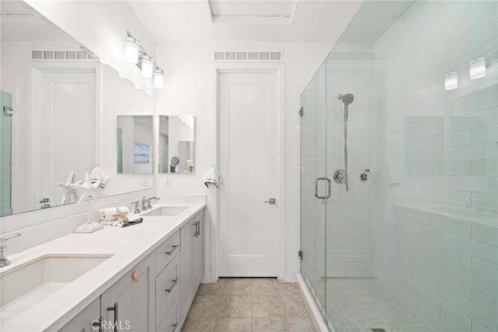 Primary suite has spa-like bathroom with dual sinks, walk-in shower and bathtub. - 230 Abacus, Irvine CA 92618 - photo 28