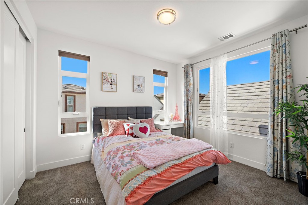 Upstairs secondary bedroom with ensuite bath - 230 Abacus, Irvine CA 92618 - photo 31