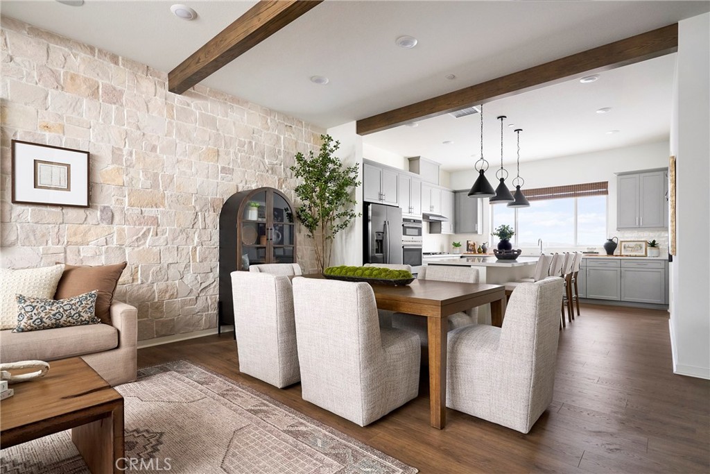 Model Photos: Photos shown are of the model home for this floor plan. Actual finishes, features, and landscaping may var - 233 Blue Wing, Irvine CA 92618 - photo 4