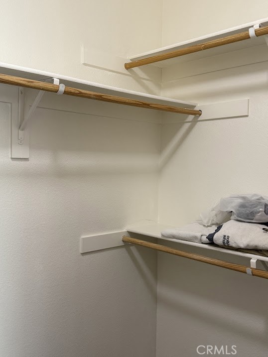 walk in closet - 2341 Watermarke Place, Irvine CA 92612 - photo 14