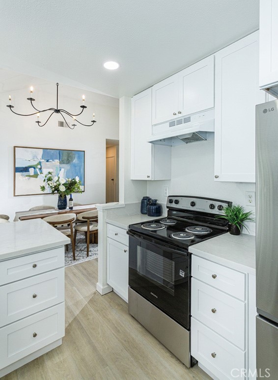 Light, bright kitchen - 24 Riverstone, Irvine CA 92606 - photo 13